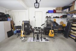 Rock,Band,Music,Equipment,In,A,Cluttered,Suburban,Garage.